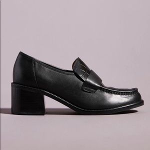 Black block heeled Anthropology loafers.